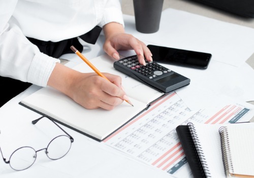 An accountant working on a business's internal audit in Peoria IL